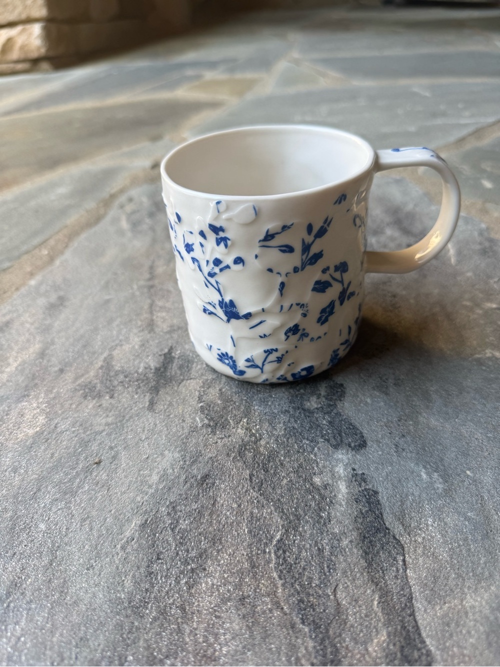 New🌟Anthropologie-White Ceramic Mug with Blue Floral Relief